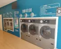 Self-service laundry + ironing